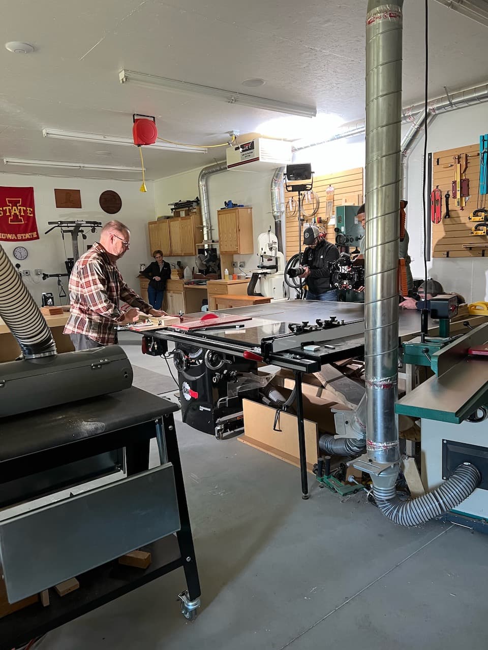 Filming Mike working at the table saw