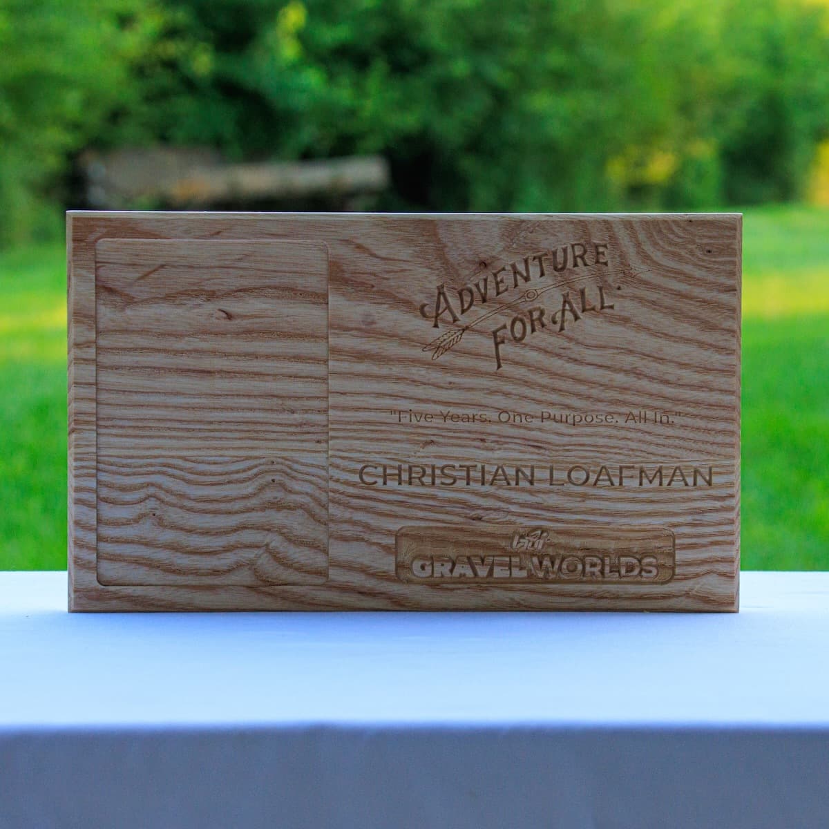 CNC-carved ash wood trophy for Christian Loafman with Adventure for All logo and recessed area for race memorabilia.