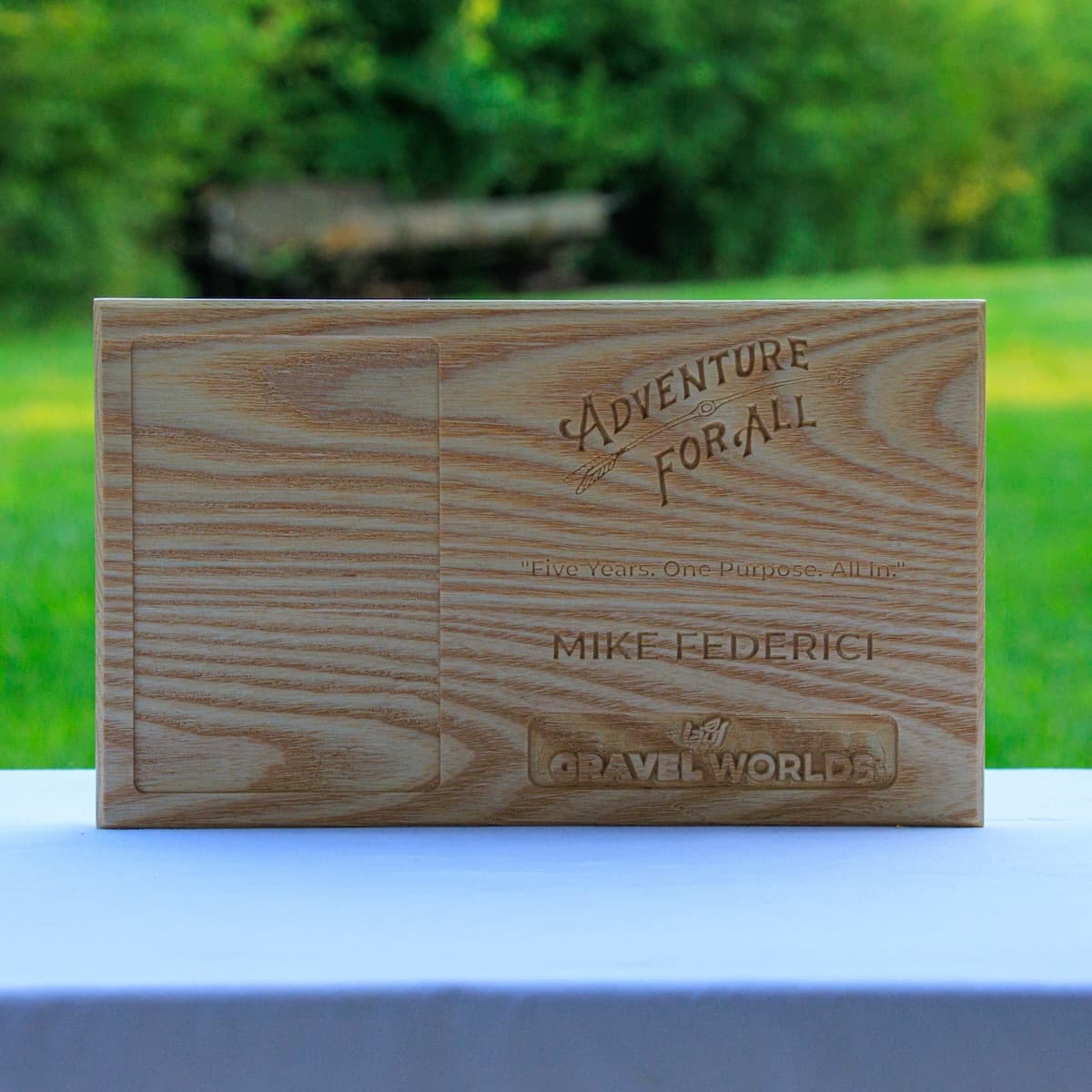 Personalized ash wood Gravel Worlds trophy for Mike Federici with CNC-engraved text and Adventure for All branding.