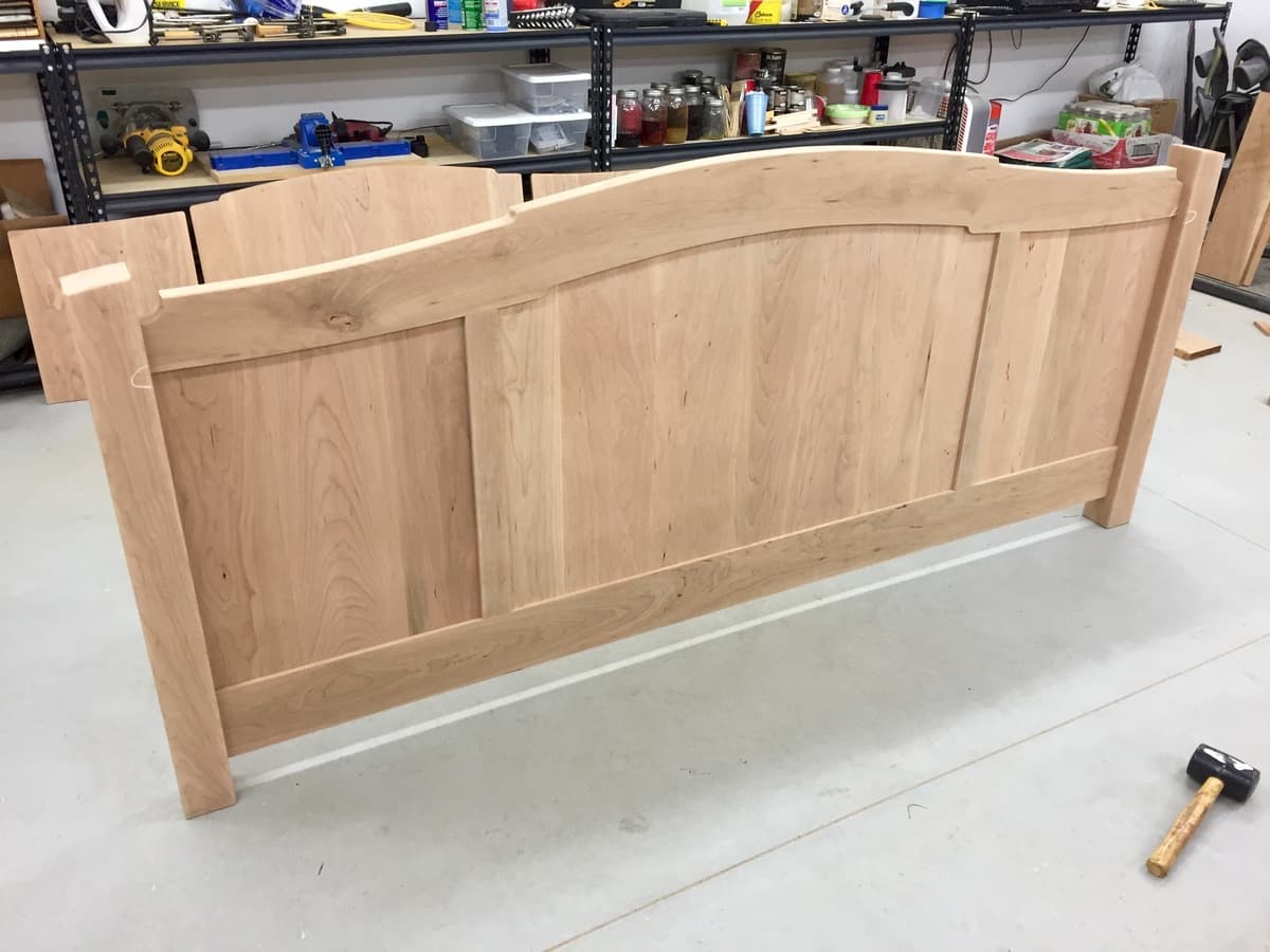 Unfinished cherry storage platform base with internal compartments