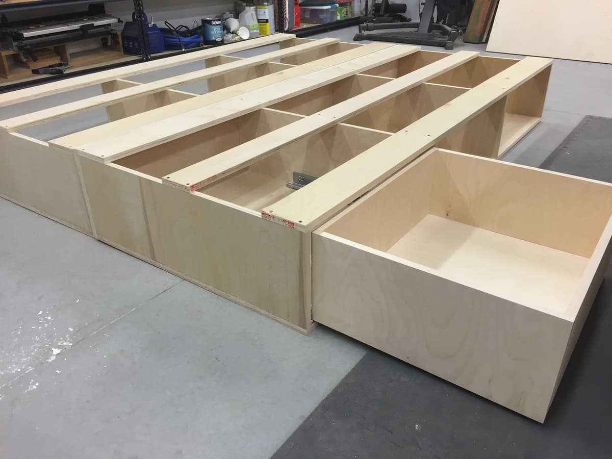 Finished cherry bed headboard with garnet shellac applied, photographed professionally