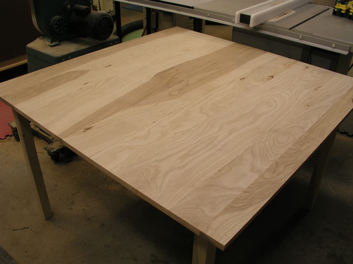 Ash kitchen table - pre-finish raw wood showing grain and natural light color