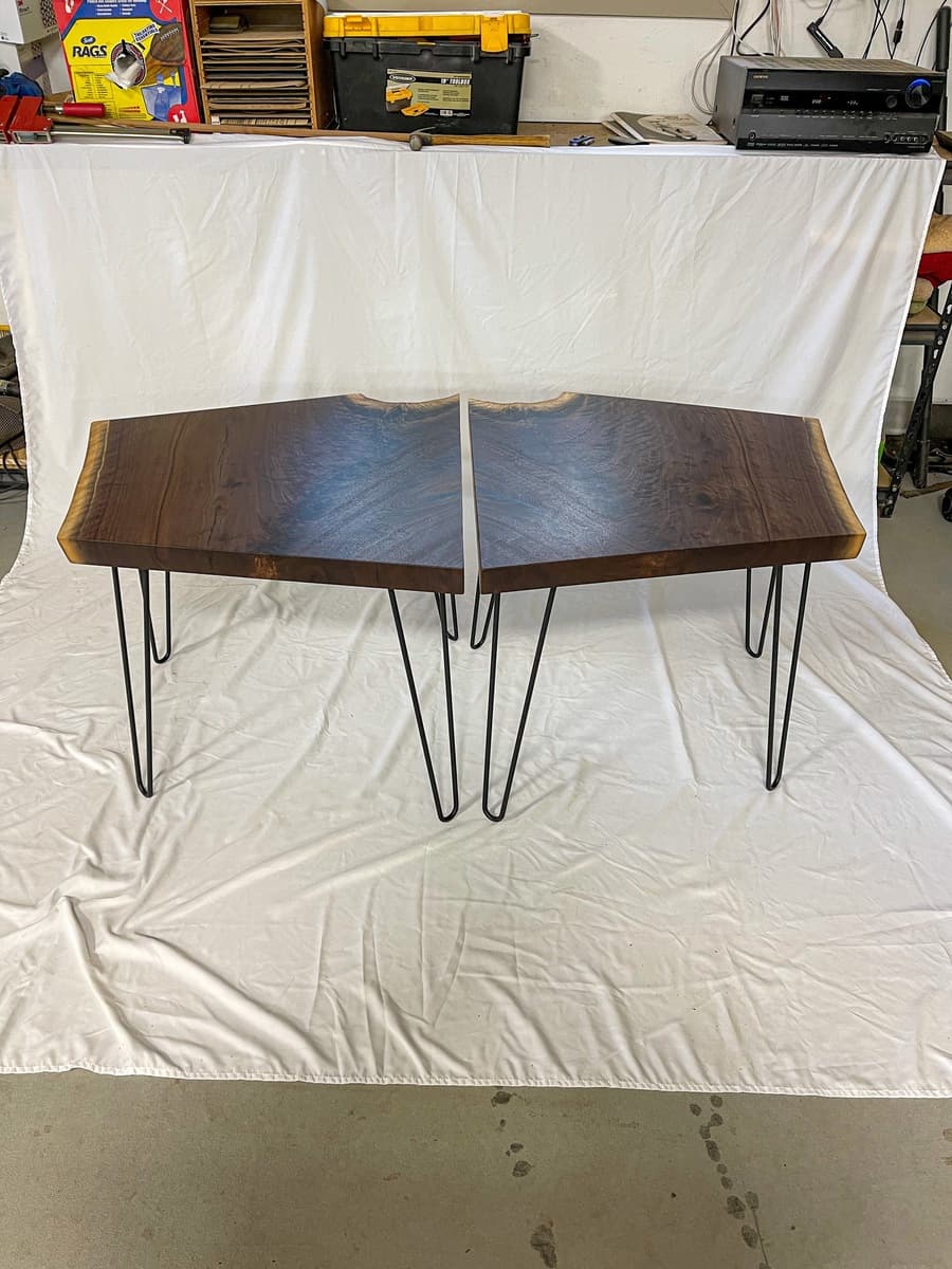 Both live edge walnut end tables positioned together showing the matching crotch grain pattern and natural wood color variation