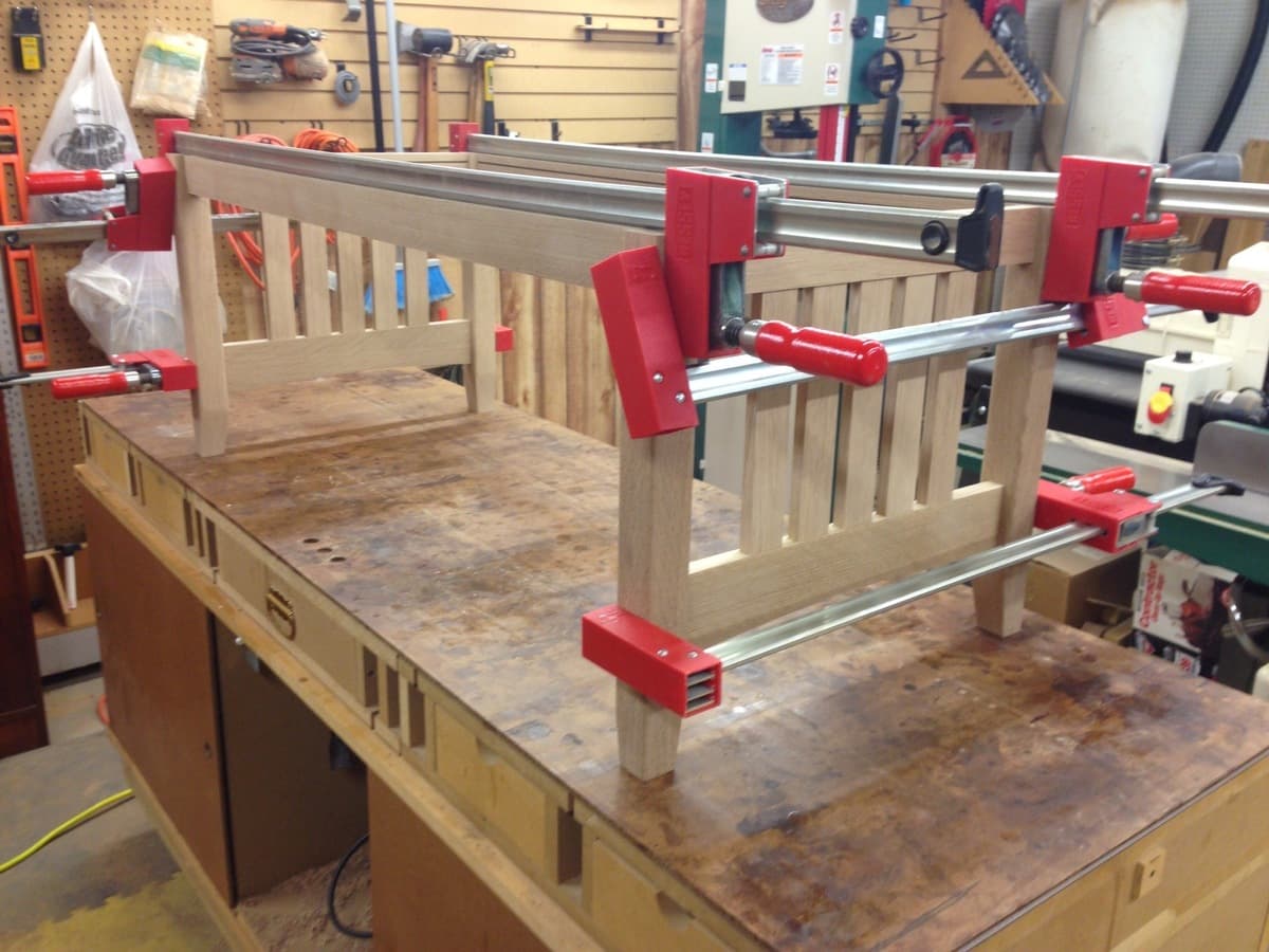 Completed mission coffee table with dark stain and finish showing slatted sides and frame construction