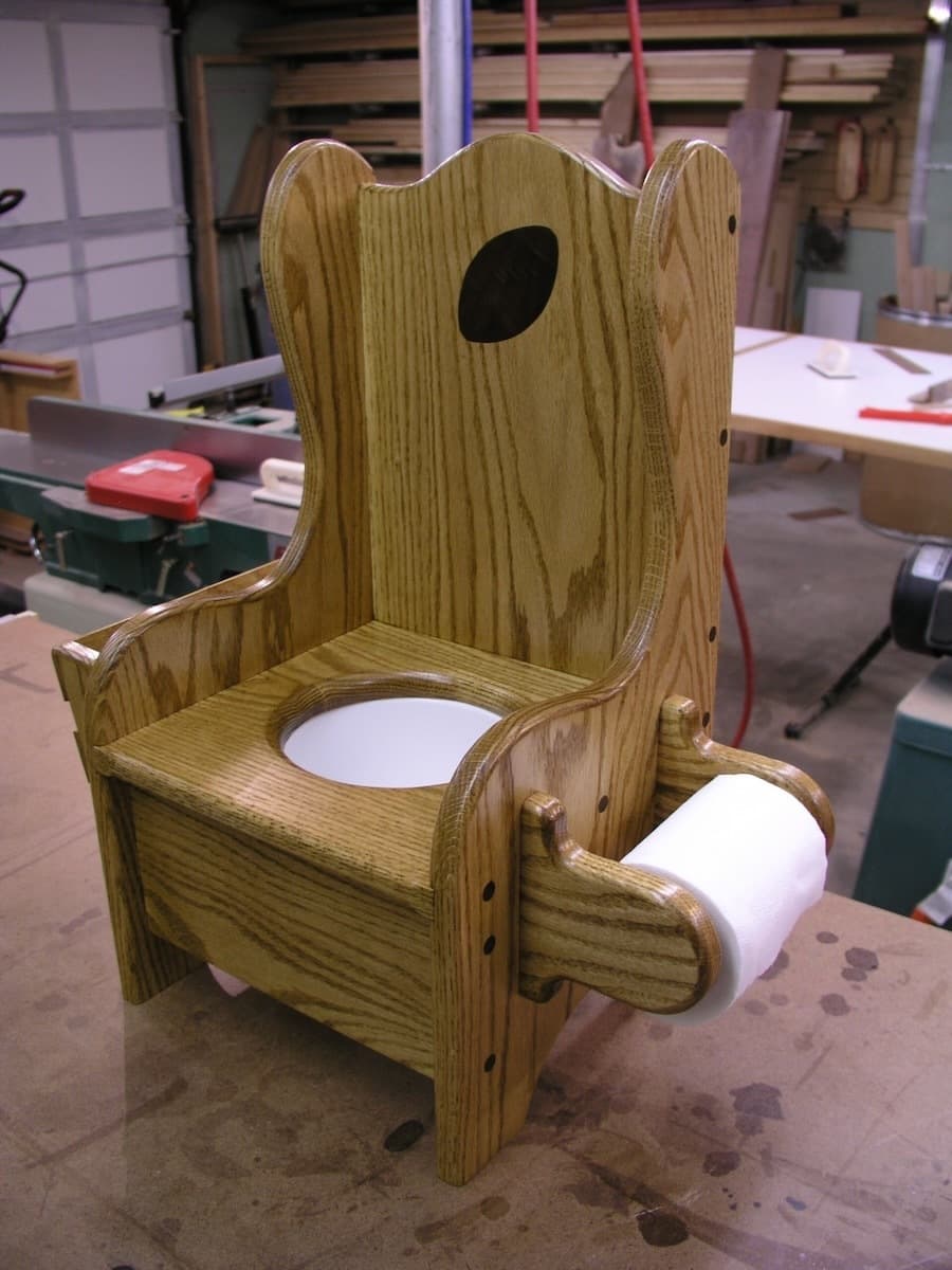 Potty chair - front view with walnut football inlay