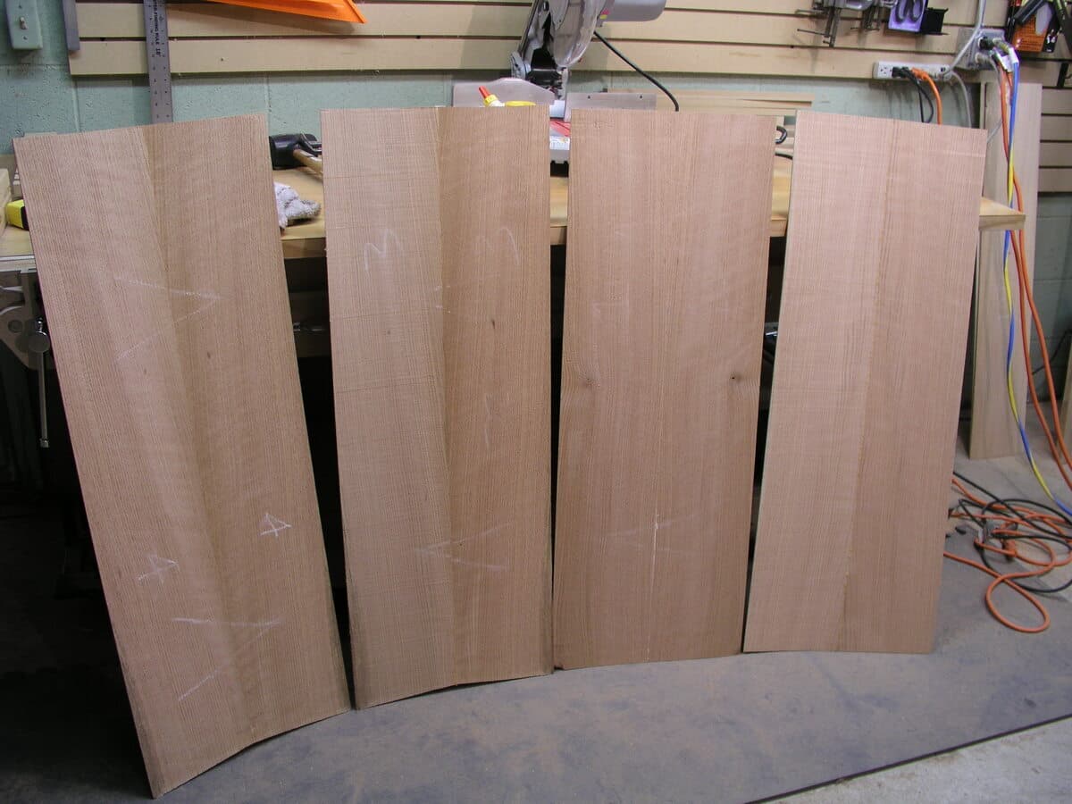 Tower speaker with red oak veneer construction showcasing natural wood grain pattern