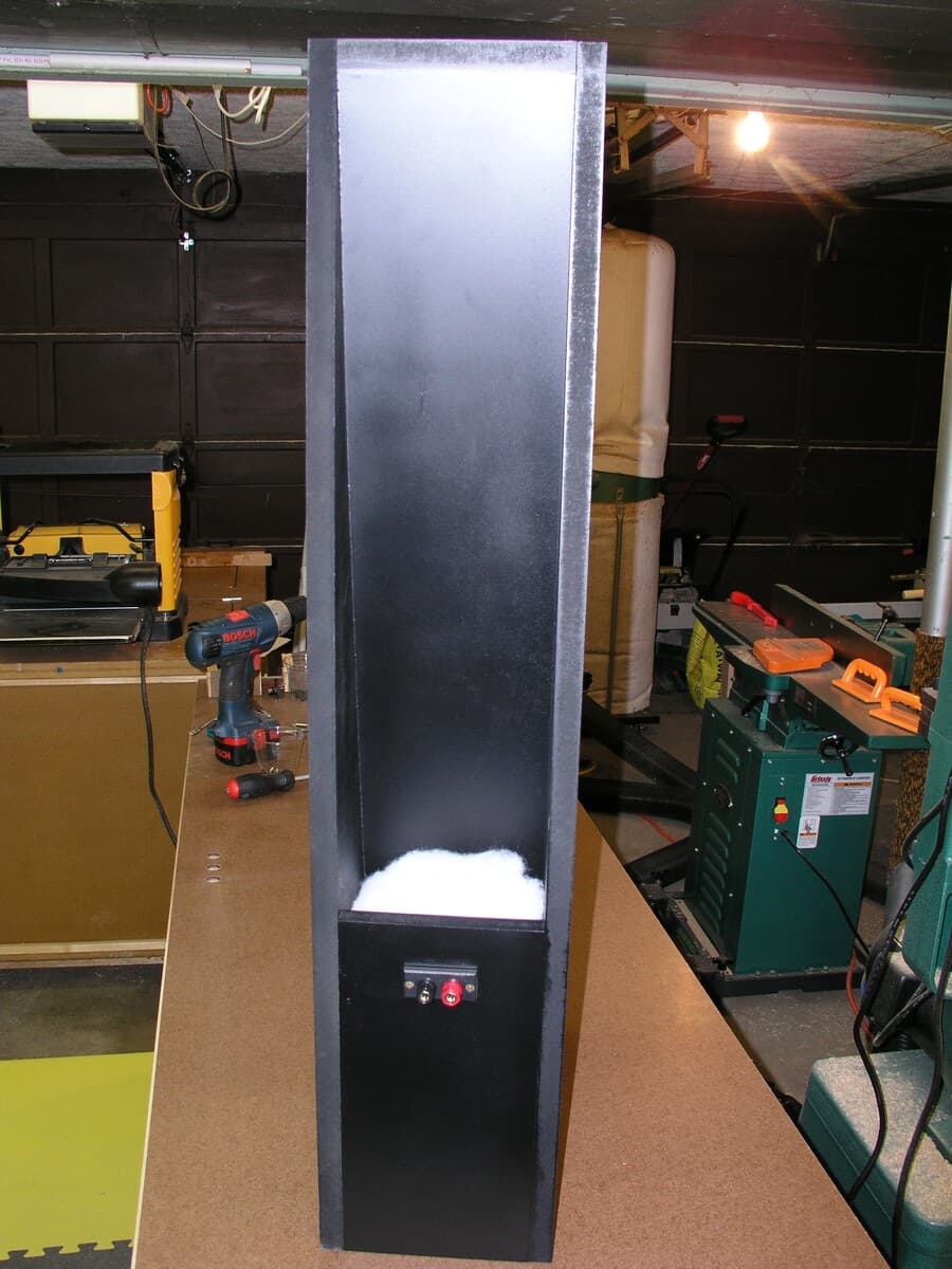 Tower speaker side profile showing constructed cabinet and red oak veneer finish