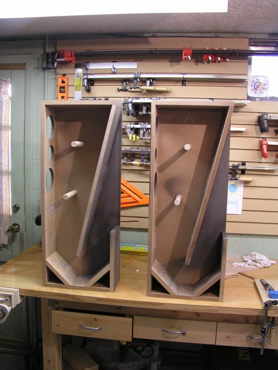 Complete tower speaker assembly displaying final finish and red oak veneer quality